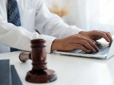 judge working at computer