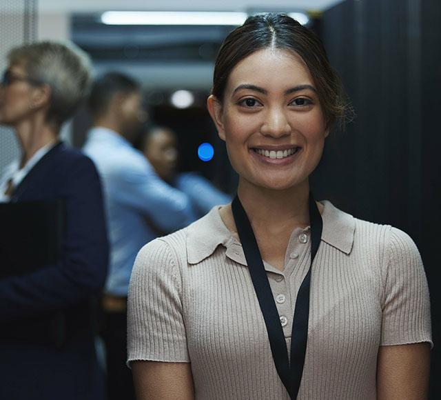 Woman working in a server room