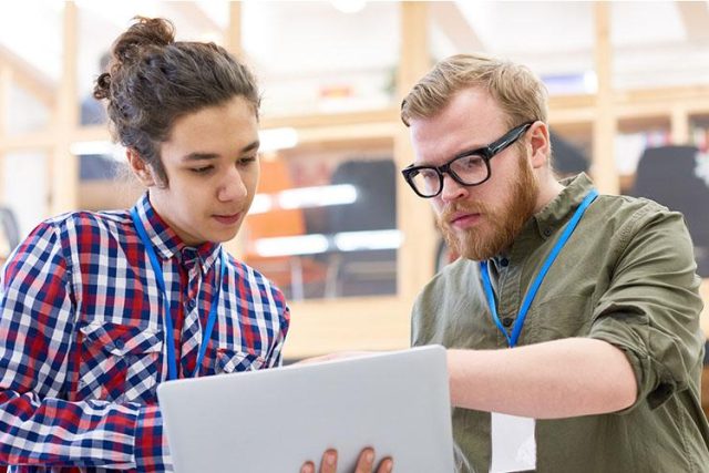 Coworkers reviewing 3-2-1 backup plan