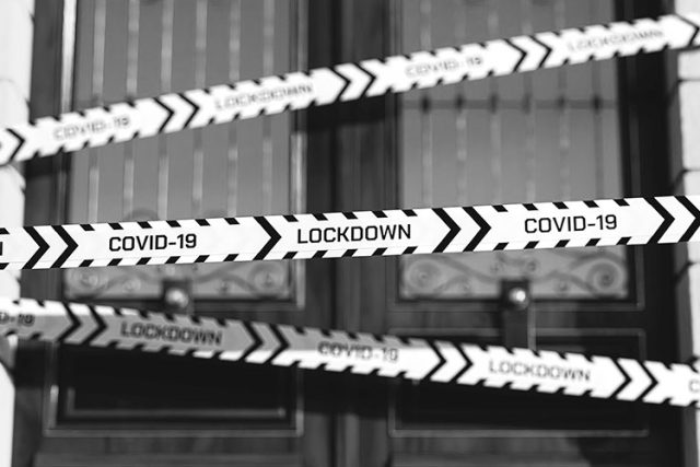 COVID-19 virus lockdown barrier tape on a door, stay at home concept, 3d render